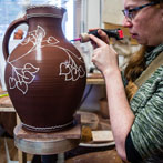 Doug Fitch and Hannah McAndrew making a jug for me